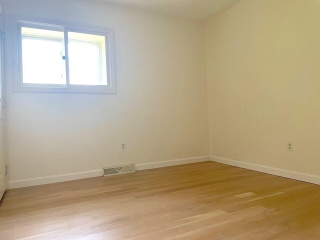 141 Sturbridge Dr, Warwick, RI 02886 - empty room featuring light wood-type flooring and baseboards