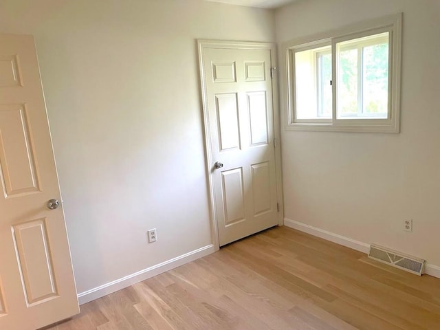 141 Sturbridge Dr, Warwick, RI 02886 - unfurnished bedroom with light wood-style floors and baseboards