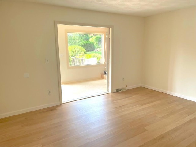 141 Sturbridge Dr, Warwick, RI 02886 - unfurnished room featuring light wood-style flooring and baseboards