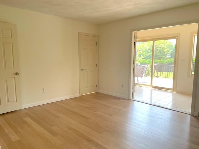 141 Sturbridge Dr, Warwick, RI 02886 - empty room featuring light wood finished floors