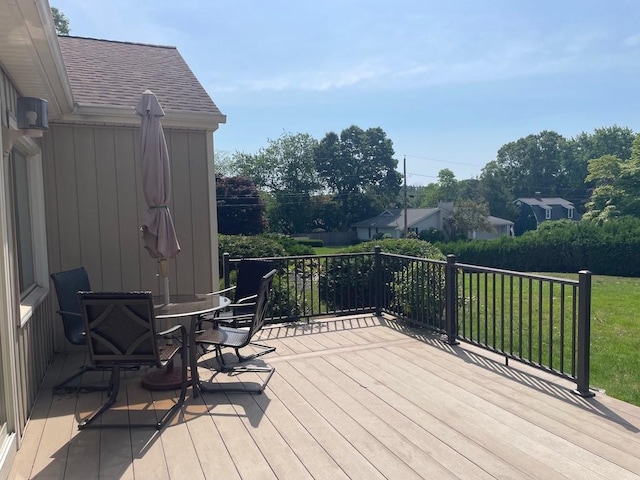 141 Sturbridge Dr, Warwick, RI 02886 - deck featuring a lawn and outdoor dining area
