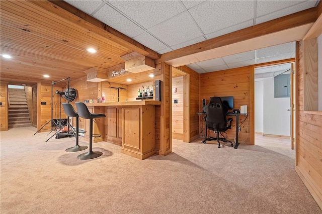 607 Knollwood Dr, Woonsocket, RI 02895 - workout area featuring wood walls, carpet flooring, recessed lighting, a bar, and electric panel