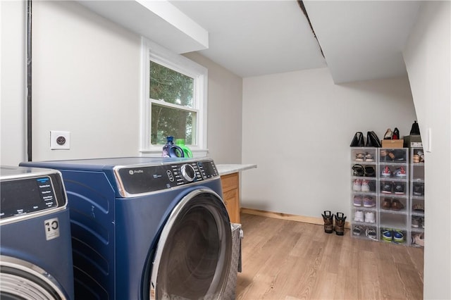 607 Knollwood Dr, Woonsocket, RI 02895 - washroom with separate washer and dryer and light wood-type flooring