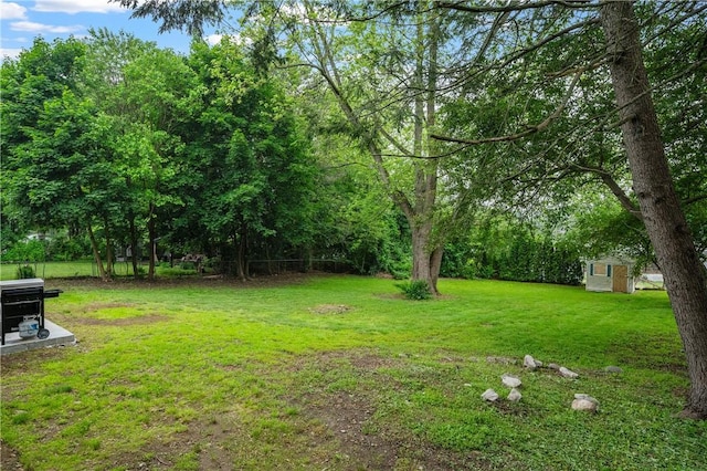 607 Knollwood Dr, Woonsocket, RI 02895 - view of green lawn with an outbuilding