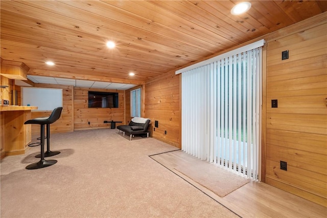 607 Knollwood Dr, Woonsocket, RI 02895 - unfurnished living room featuring wood walls and wood ceiling