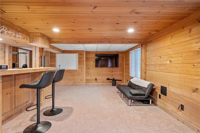 607 Knollwood Dr, Woonsocket, RI 02895 - bar area with light colored carpet, wooden ceiling, wooden walls, and recessed lighting