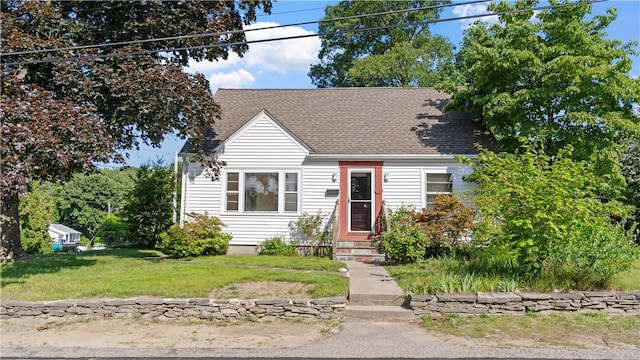 92 Glendale Dr, West Warwick, RI 02893 - new england style home featuring a front yard, entry steps, and a shingled roof