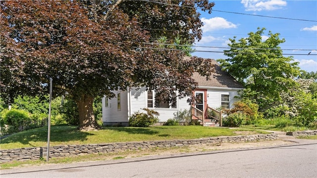 92 Glendale Dr, West Warwick, RI 02893 - obstructed view of property with entry steps and a front lawn