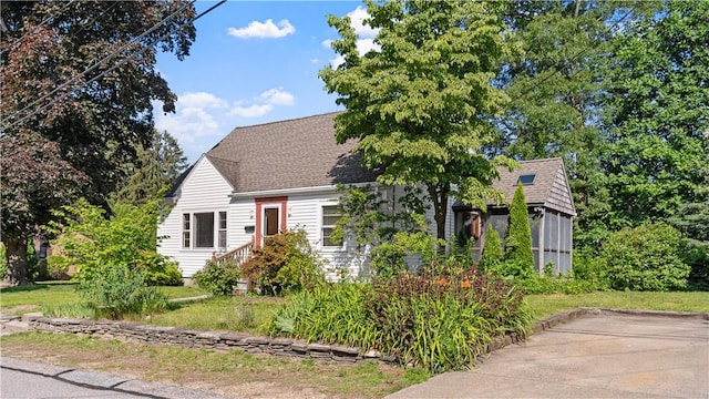 92 Glendale Dr, West Warwick, RI 02893 - view of front of house with a shingled roof