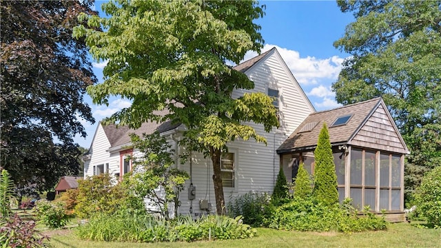 92 Glendale Dr, West Warwick, RI 02893 - view of side of home featuring a sunroom and a shingled roof