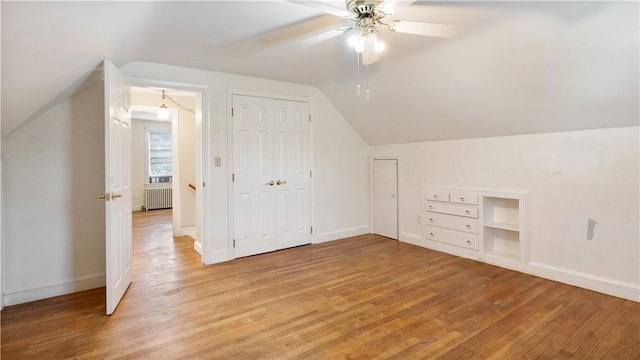 92 Glendale Dr, West Warwick, RI 02893 - bonus room featuring radiator, light wood-type flooring, lofted ceiling, and ceiling fan