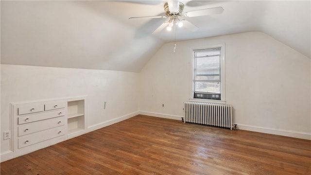 92 Glendale Dr, West Warwick, RI 02893 - additional living space featuring radiator heating unit, wood finished floors, ceiling fan, and lofted ceiling