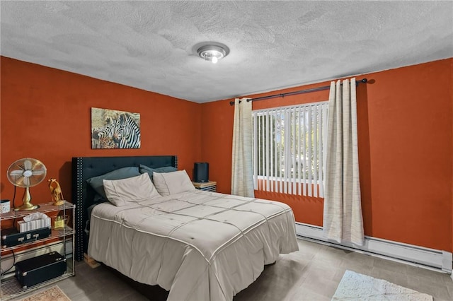 4 Clarke St, Warwick, RI 02886 - bedroom with a baseboard radiator and a textured ceiling