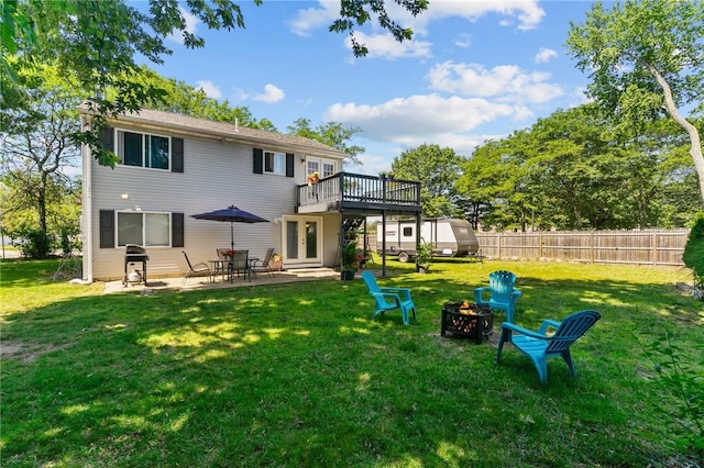 4 Clarke St, Warwick, RI 02886 - back of house featuring a fire pit, a patio area, a deck, and french doors
