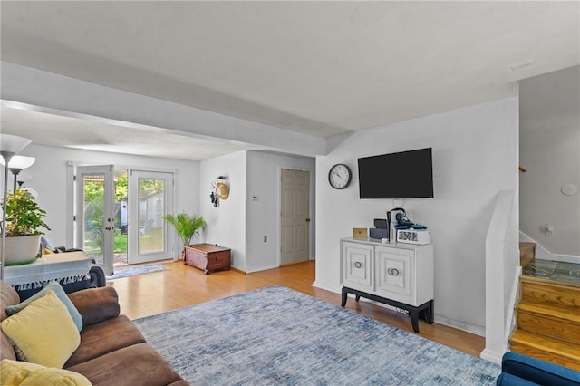 4 Clarke St, Warwick, RI 02886 - living area featuring wood finished floors and stairs