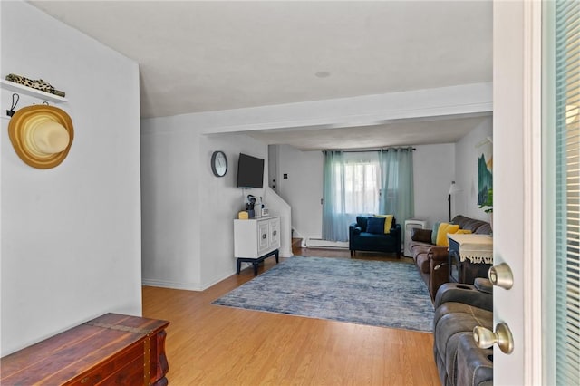4 Clarke St, Warwick, RI 02886 - living area with wood finished floors and baseboard heating