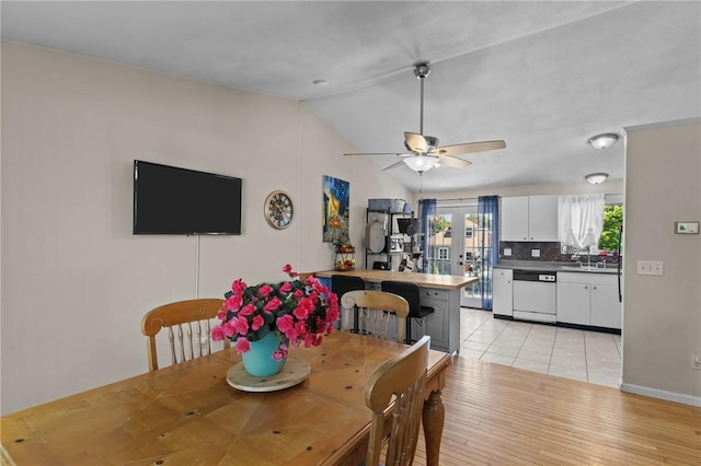 4 Clarke St, Warwick, RI 02886 - dining area featuring lofted ceiling, light wood-style flooring, and ceiling fan