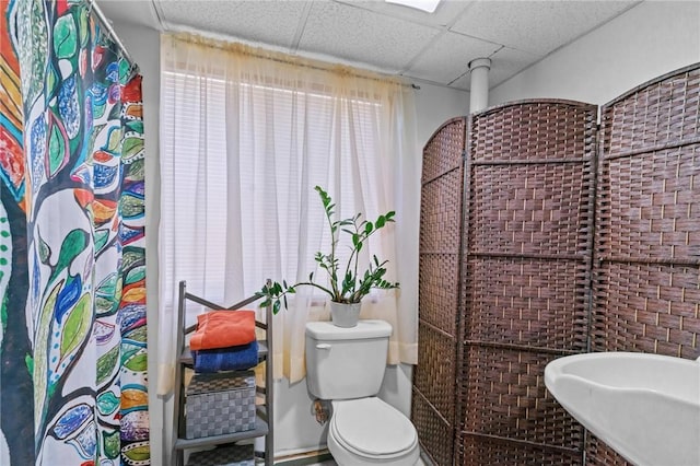 4 Clarke St, Warwick, RI 02886 - bathroom featuring a drop ceiling and toilet