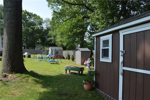 27 Observatory Rd, Warwick, RI 02888 - view of yard featuring a storage unit and a playground