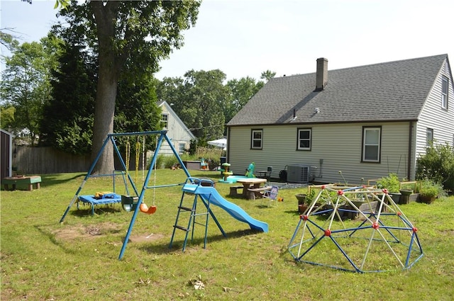 27 Observatory Rd, Warwick, RI 02888 - back of property featuring a playground and a chimney