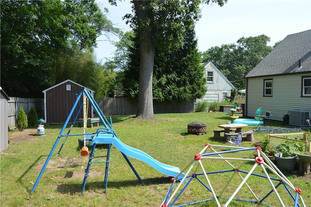 27 Observatory Rd, Warwick, RI 02888 - fenced backyard featuring a playground, a shed, and an outdoor fire pit