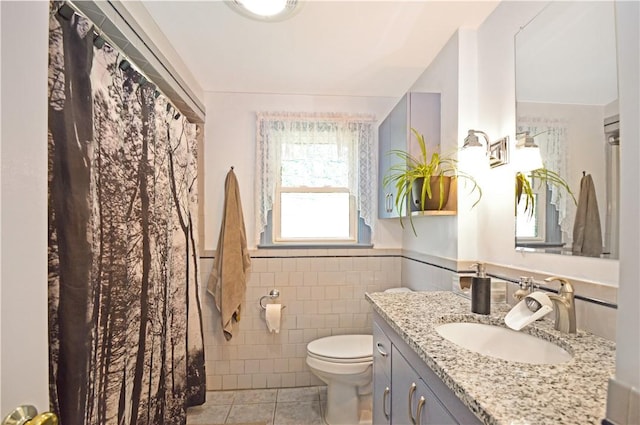 27 Observatory Rd, Warwick, RI 02888 - full bathroom featuring tile patterned flooring, vanity, tile walls, and wainscoting