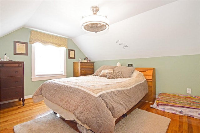 27 Observatory Rd, Warwick, RI 02888 - bedroom featuring lofted ceiling and wood finished floors