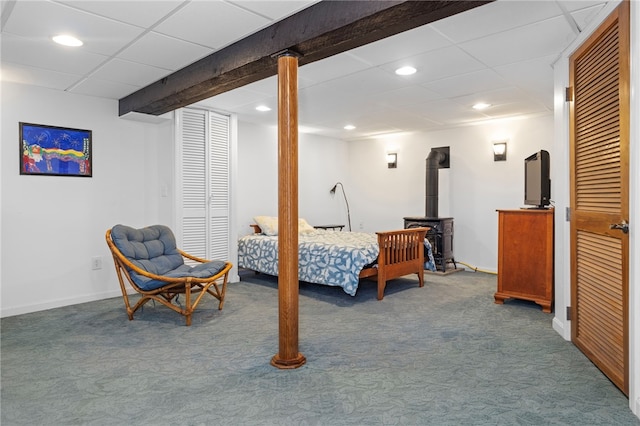 161 Ferncrest Ave, Cranston, RI 02905 - bedroom with carpet flooring, a wood stove, and recessed lighting