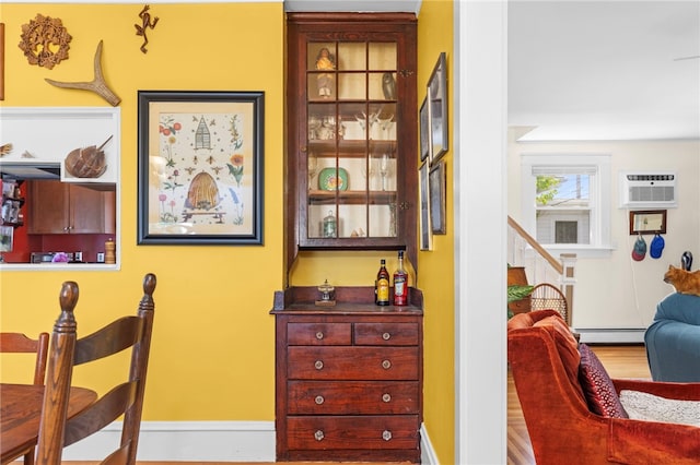 161 Ferncrest Ave, Cranston, RI 02905 - office space with a wall unit AC and a baseboard radiator