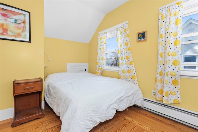 161 Ferncrest Ave, Cranston, RI 02905 - bedroom featuring a baseboard radiator, lofted ceiling, and wood finished floors