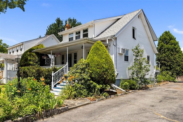161 Ferncrest Ave, Cranston, RI 02905 - view of front facade with covered porch, a chimney, and stairs