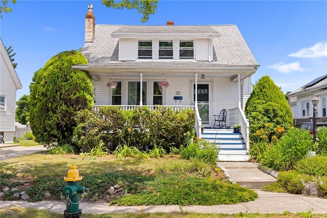 161 Ferncrest Ave, Cranston, RI 02905 - bungalow featuring covered porch and a chimney