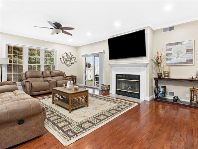2 Medinah Dr, West Warwick, RI 02893 - living area featuring ceiling fan, hardwood / wood-style flooring, a fireplace with flush hearth, recessed lighting, and crown molding