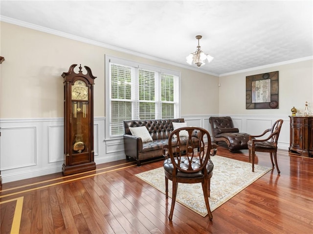 2 Medinah Dr, West Warwick, RI 02893 - living room with wood-type flooring, ornamental molding, a chandelier, and wainscoting