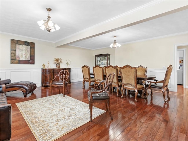 2 Medinah Dr, West Warwick, RI 02893 - living area featuring a chandelier, hardwood / wood-style floors, ornamental molding, a decorative wall, and wainscoting