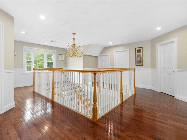 2 Medinah Dr, West Warwick, RI 02893 - corridor with wainscoting, a chandelier, hardwood / wood-style floors, recessed lighting, and an upstairs landing