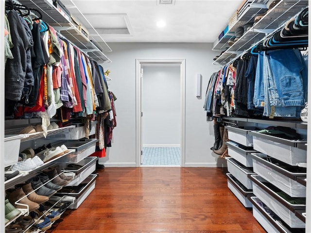 2 Medinah Dr, West Warwick, RI 02893 - spacious closet featuring attic access and wood finished floors