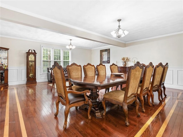 2 Medinah Dr, West Warwick, RI 02893 - dining space with a chandelier, hardwood / wood-style flooring, a wainscoted wall, a decorative wall, and crown molding