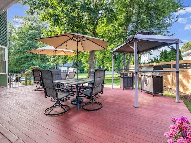 2 Medinah Dr, West Warwick, RI 02893 - deck featuring outdoor dining area, area for grilling, and a gazebo