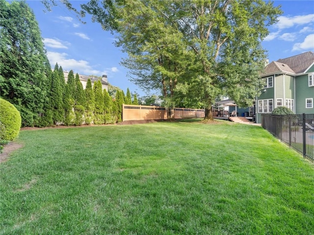 2 Medinah Dr, West Warwick, RI 02893 - fenced backyard featuring a wooden deck