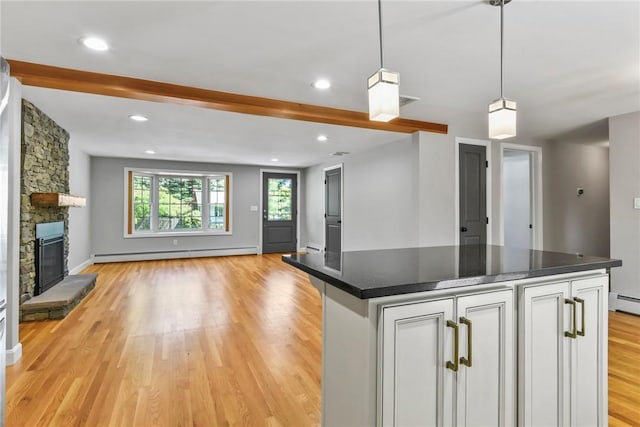 88 Grand View Rd, East Greenwich, RI 02818 - kitchen with a baseboard heating unit, open floor plan, light wood-style floors, dark countertops, and recessed lighting
