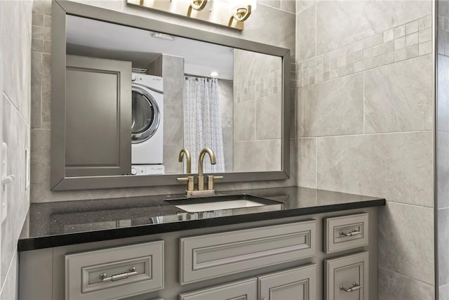 88 Grand View Rd, East Greenwich, RI 02818 - full bathroom featuring stacked washer and clothes dryer and vanity