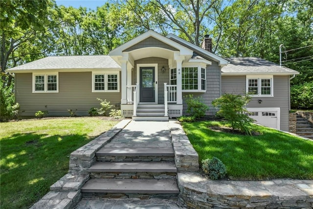 88 Grand View Rd, East Greenwich, RI 02818 - view of front of property with a chimney, a front yard, a garage, and roof with shingles
