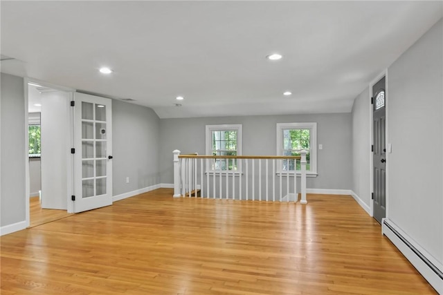 88 Grand View Rd, East Greenwich, RI 02818 - spare room with a baseboard radiator, light wood finished floors, and recessed lighting