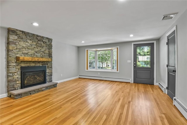 88 Grand View Rd, East Greenwich, RI 02818 - unfurnished living room featuring a baseboard radiator, light wood-type flooring, a fireplace, and recessed lighting