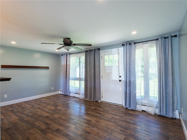 69 Haverhill Ave, Warwick, RI 02886 - empty room with a ceiling fan, dark wood-type flooring, recessed lighting, and baseboard heating