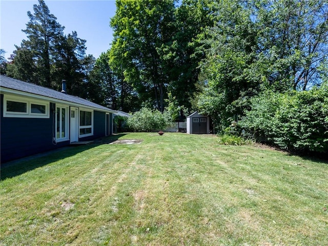 69 Haverhill Ave, Warwick, RI 02886 - view of green lawn with a storage shed