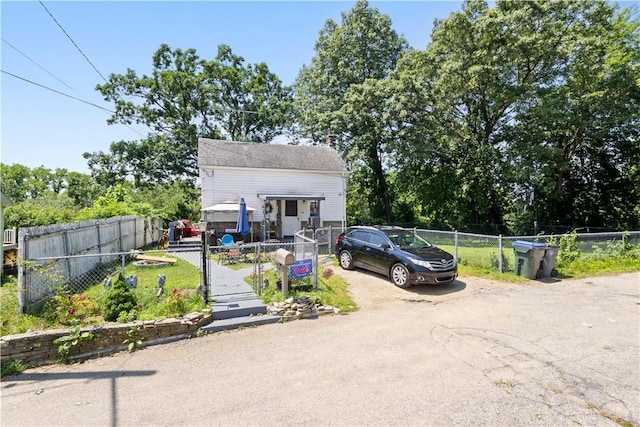 10 Sacramento St, Providence, RI 02909 - view of front of property with a fenced front yard and a gate
