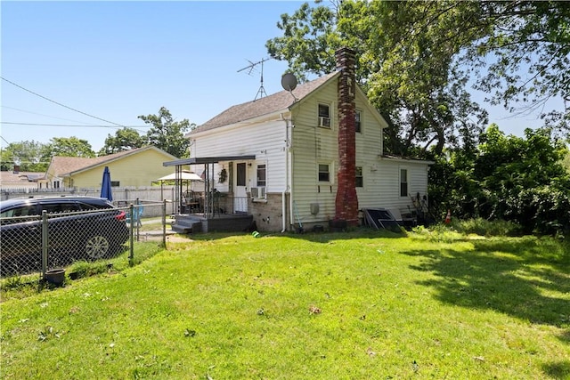 10 Sacramento St, Providence, RI 02909 - view of side of property featuring a chimney and cooling unit