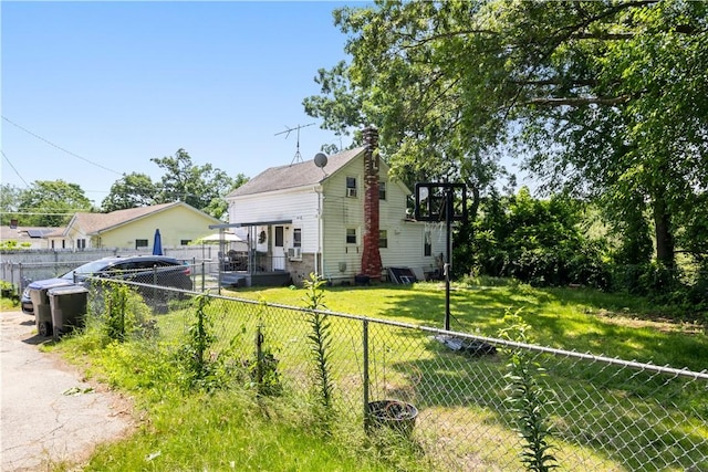 10 Sacramento St, Providence, RI 02909 - view of side of property featuring a fenced backyard and a chimney